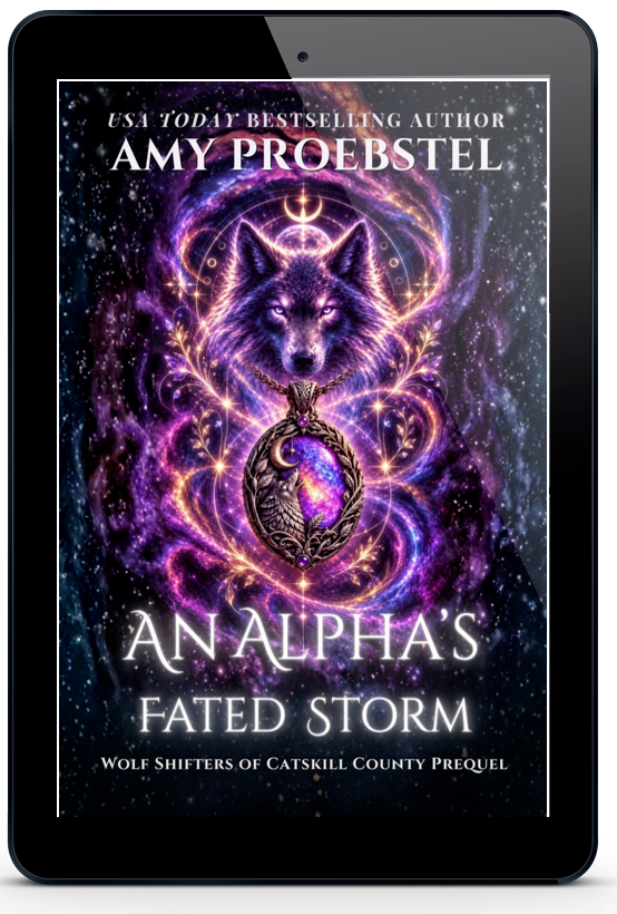 A black tablet device centered on a light gray background, displaying a book cover for 'An Alpha's Fated Storm' by Amy Proebstel. The cover art features a glowing purple and pink wolf motif over a dark starry background.