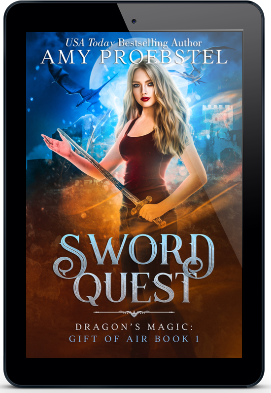 A tablet device displaying the book cover for 'Sword Quest' by Amy Proebstel. The cover art features a fantasy illustration of a woman holding a sword, with blue and orange glowing elements and the title in large stylized text.