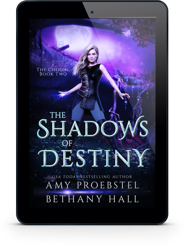 A tablet device displaying the book cover for 'The Shadows of Destiny' by Amy Proebstel and Bethany Hall, set against a plain white background.